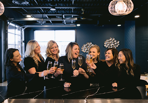 holland-venue-waterfront-team-cheers-champagne