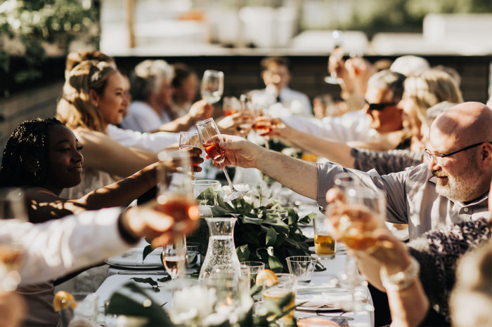 wedding guests sharing a toast